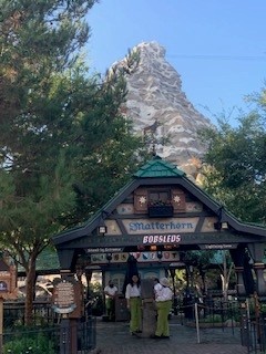 Entrance to the Matterhorn Bobsleds ride at Disneyland, with the mountain peak in the background.