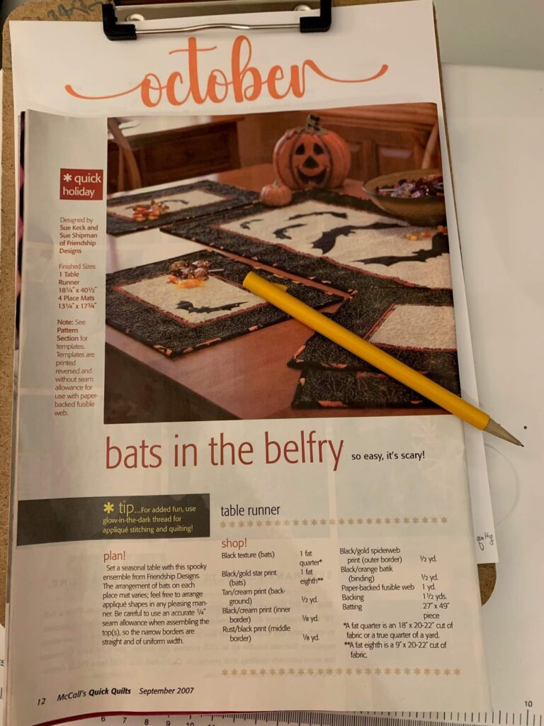 Open magazine showing the original Halloween Bats placemats and table runner pattern