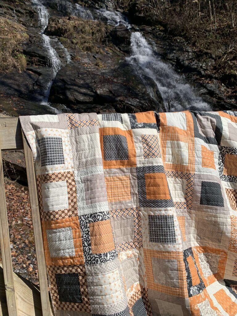 Fall Framed Windows quilt photographed at Amicalola Falls State Park in Georgia