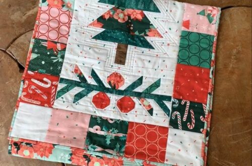 Under the Pines table folded and laid on wooden table with partial tree and berries showing